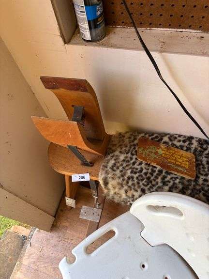 Table with chair, sign with fan
