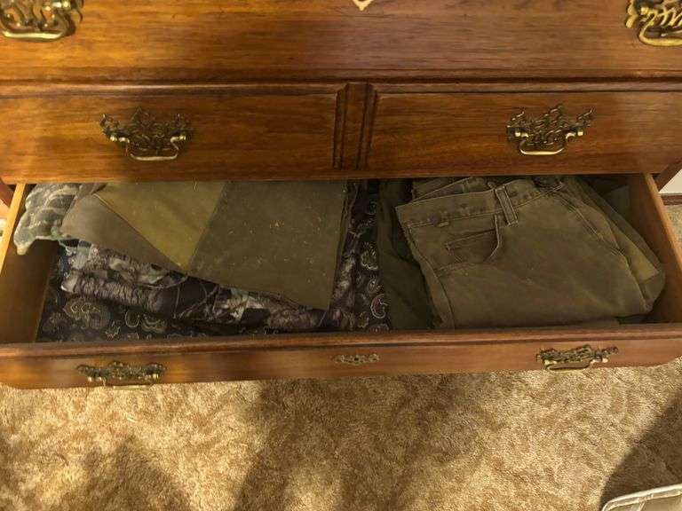 Dresser with clothes