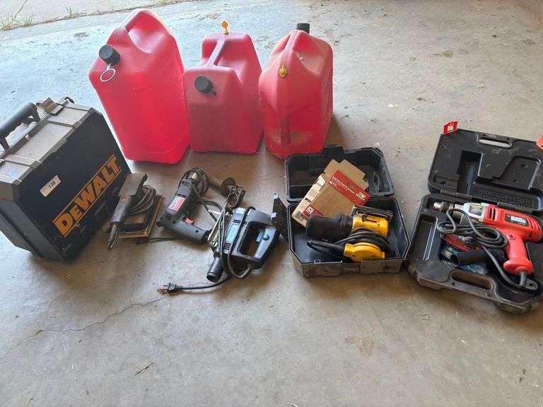 3 Gas cans with tools