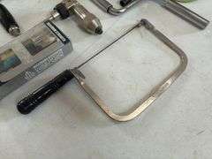 Hand Drill, Hand Crank Wrench, Screw Drivers, Florite Grill Velocity Finder, Blade in Sheath, Torque