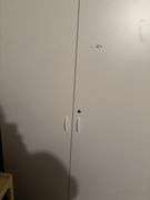 Filing cabinet, coffee mugs, coffee maker, misc decor
