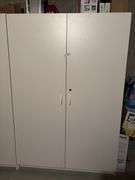 Cabinet with pillows, and blankets