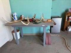 Table with antlers head mount misc