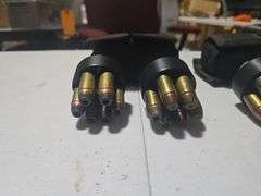 (4) Revolver Speed Loaders and (2) Speed Loader Pouches