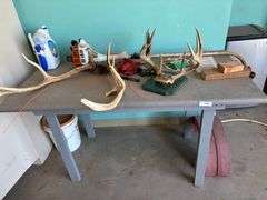 Table with antlers head mount misc