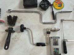 Hand Drill, Hand Crank Wrench, Screw Drivers, Florite Grill Velocity Finder, Blade in Sheath, Torque