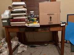 Empty boxes , books, coloring with books , jars, buttons, table, net gear router misc