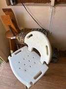 Table with chair, sign with fan