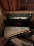 Empty boxes , books, coloring with books , jars, buttons, table, net gear router misc