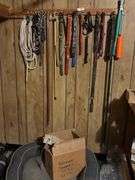 Dog bed with retriever dummies, dog leashes
