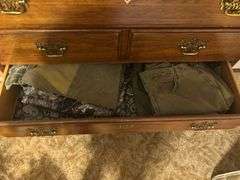 Dresser with clothes