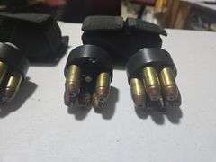 (4) Revolver Speed Loaders and (2) Speed Loader Pouches