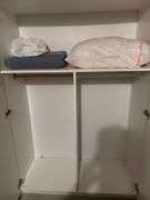 Cabinet with pillows, and blankets