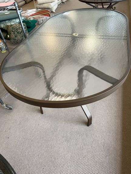 76 x 42 oval glass top wrought iron table