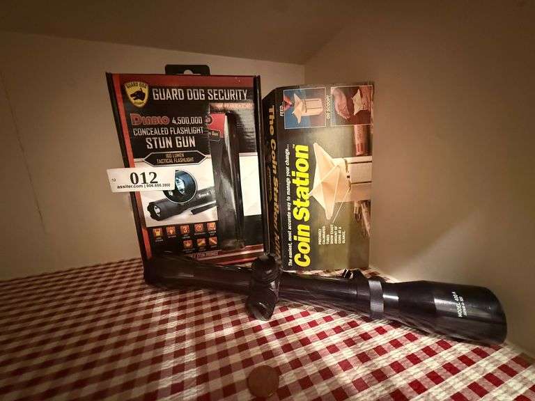 Flashlight Stun Gun and Coin Station