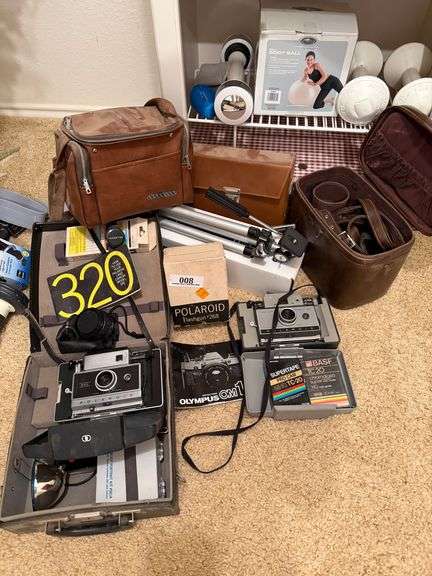 Polaroid Flashgun 268 with Camera Bags, Tripod, and Other Camera Equipment
