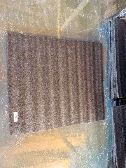 Stack of Ribbed Foam Floor Mats/Tiles