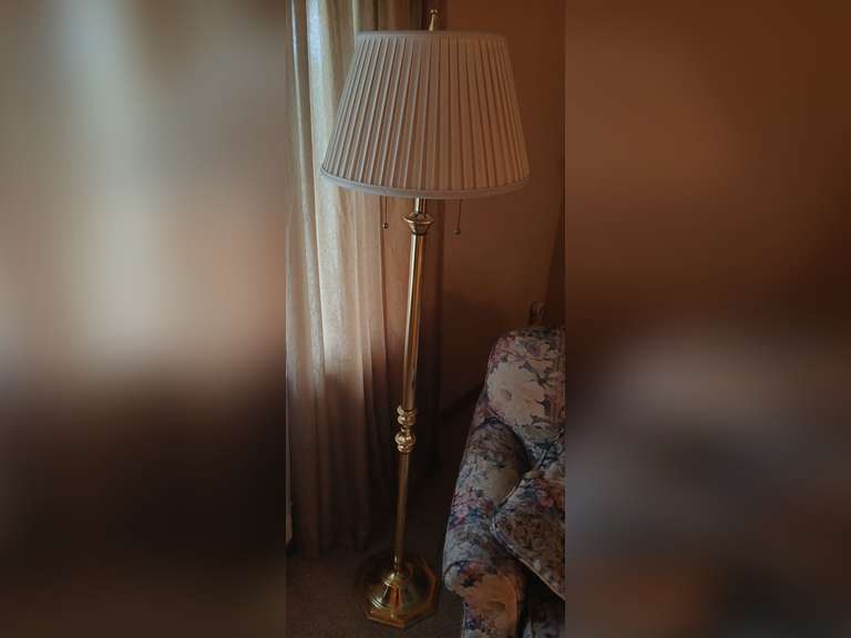 Brass floor lamp with cream shade. 63"h