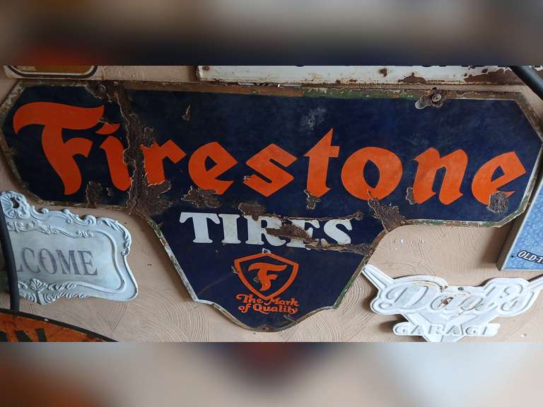 Firestone Tires blue & orange advertising sign, 36x26. Shows some wear