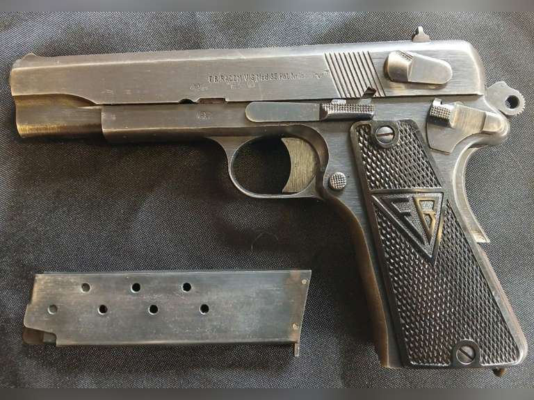 A Small Collection with a Grand Story! Several items acquired from "The Battle of the Bulge." FB Radom Vis P.35 9mm luger Mod.35, Early Marlboro & zippo lighters, other collectibles. Austintown OH