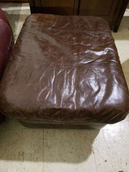 Dark red recliner & foot rest