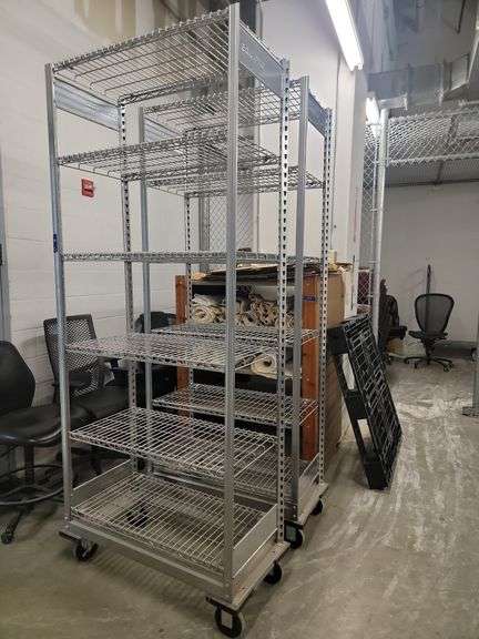 To 8 ft tall heavy duty rolling metal racks - Advantage Auction