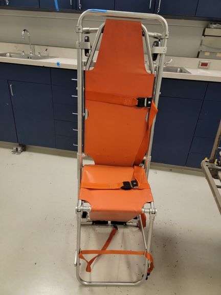 Orange patient transporter - Advantage Auction