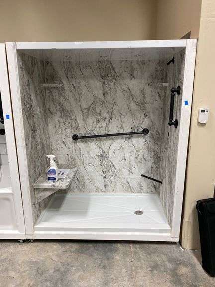 Marble-Patterned Shower Display With Grab Bars