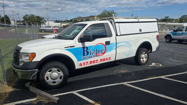 2008 Ford F-150 2 door, V6, 180k miles 2wd with topper and slide out shelve.