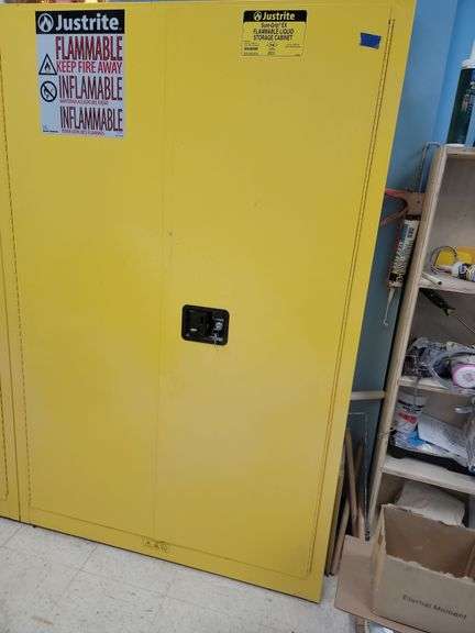 Yellow storage box for flammable material, one box only approximately 5 ft x 3 ft, no contents inclu