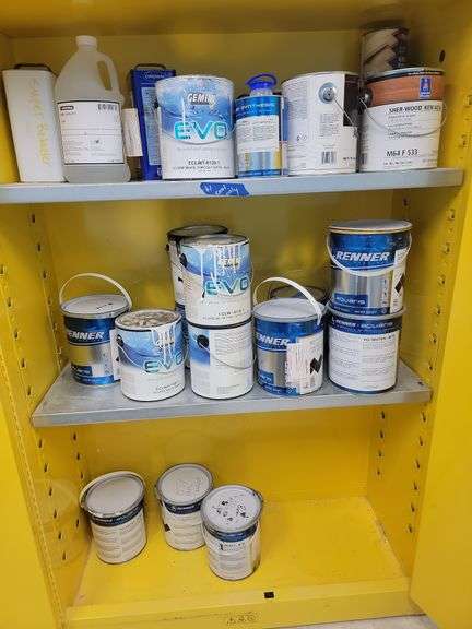 Contents of number 57 yellow cabinet assorted paint