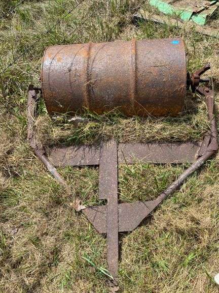 Rusty Metal Drum Kohls With Frame Attachment