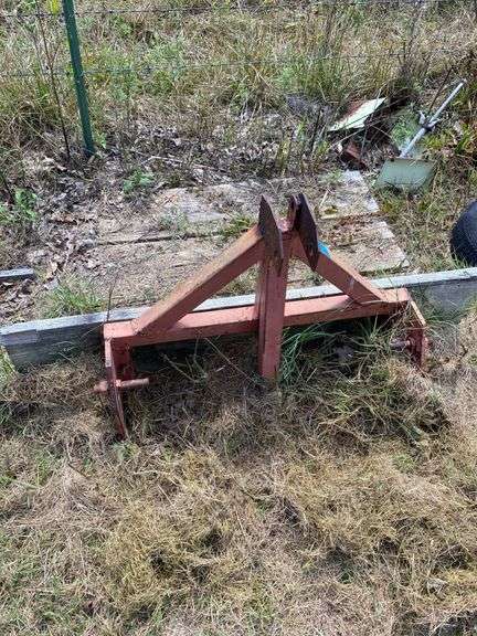 Red Metal Tractor Three-Point Hitch Attachment