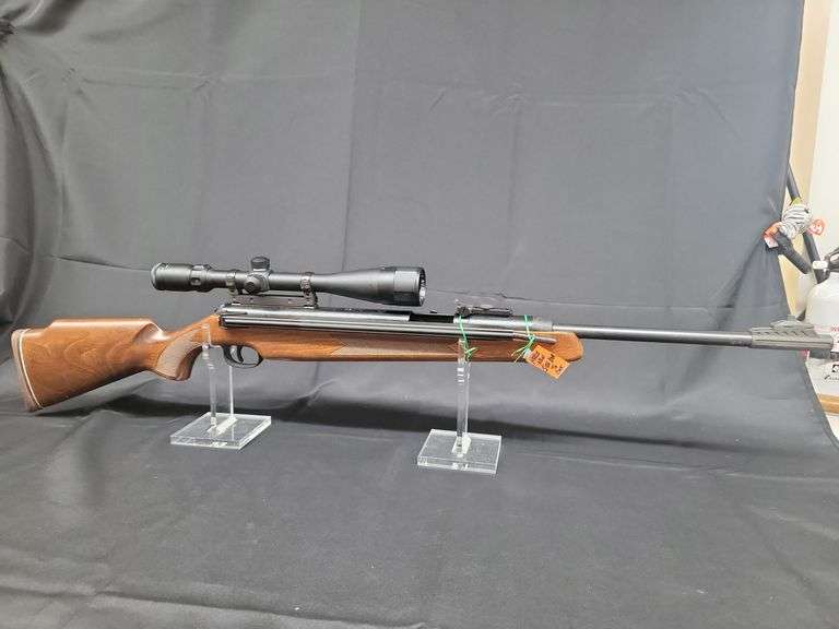 Diana model 52 rifle  serial # 02093029  cal 5.5 .22 with bushnell scope. Needs new side bar to cock