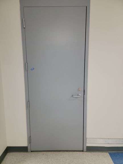 Metal door,  purchaser will need to remove