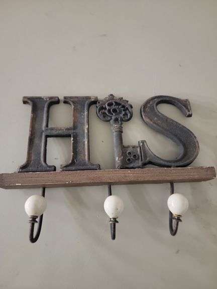 His jacket rack - Advantage Auction