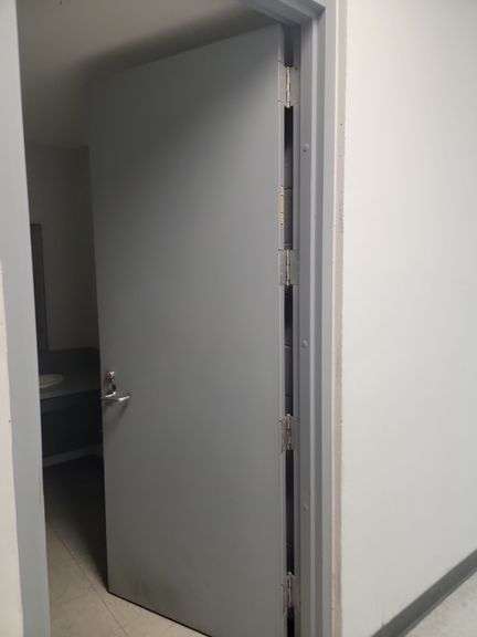 3 ft x 7 ft steel door, will need to be removed by purchaser