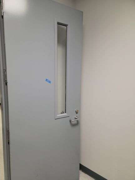 Steel door 7 ft x 3 ft with small window