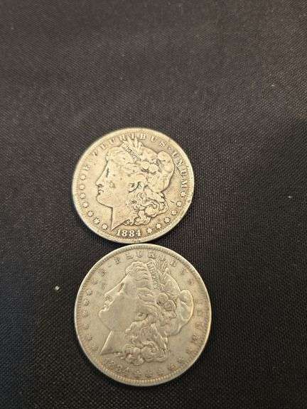 2, 1884 Morgan silver dollars.