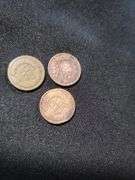 Three Indian head pennies