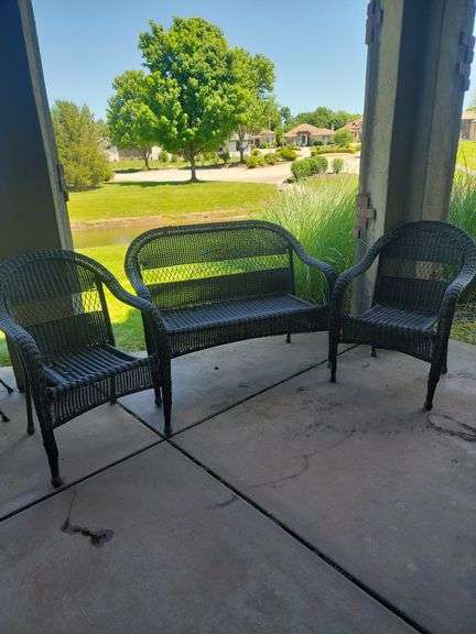 Wicker love seat, two chairs downstairs outside patio