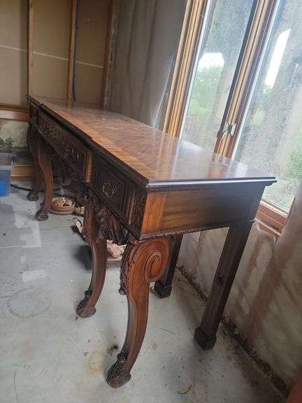 Large antique serving table in basement