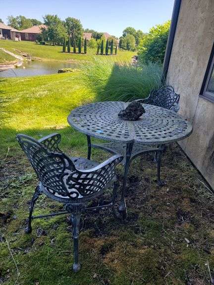 Vintage aluminum patio table & two chairs downstairs outside patio