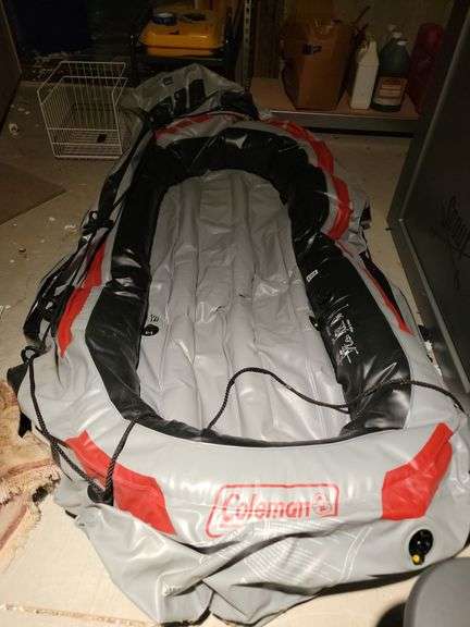 Coleman inflatable boat in basement back room