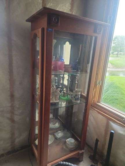 Curio cabinet no contents in basement
