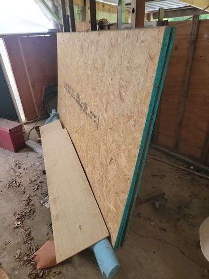 Four 4x8 sheets of underlayment, and two three by five pieces of sheetrock, rack not included