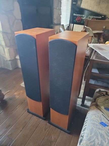 Two, wood encased Monitor Audio speakers approximately 3 ft tall, very nice