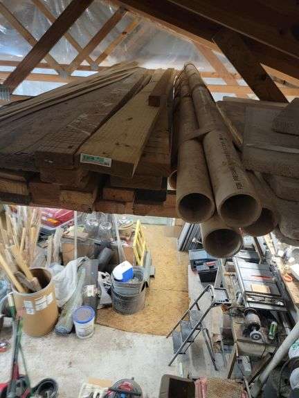 2x4s approximately 12ft and PVC pipes in loft area