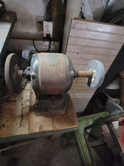 Vintage Marathon bench grinder still attached to table top