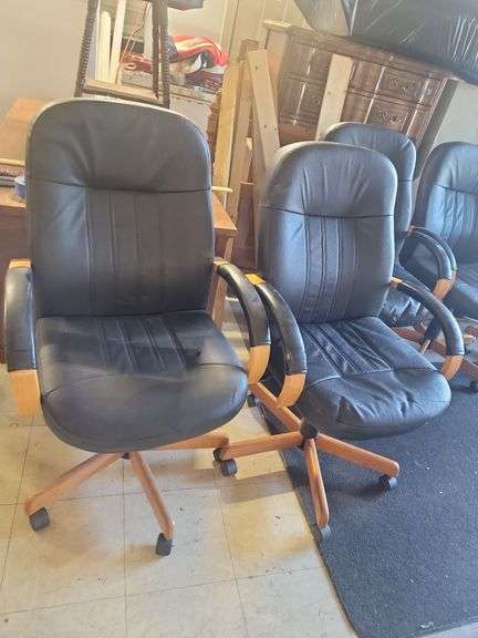 5 black office chairs